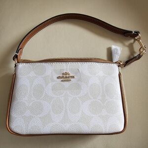COACH NOLITA 19 IN BLOCKED SIGNATURE CANVAS